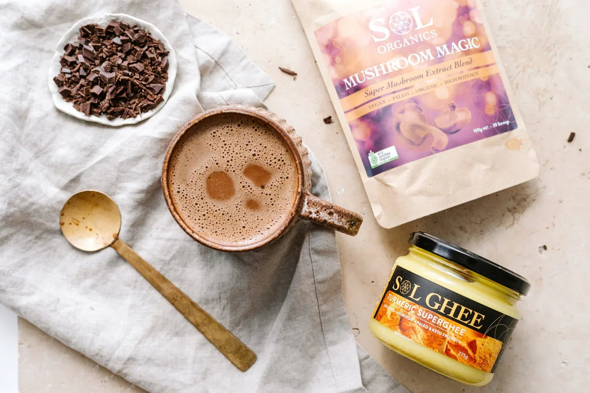 Cup of adaptogenic hot beverage made with Sol Organics mushroom blend