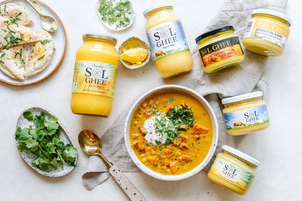 Jar of Sol Organics ghee on a kitchen bench